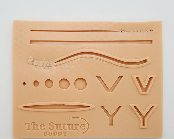 The Suture Buddy Pad with Port Holes