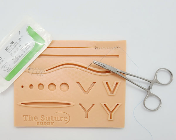 The Suture Buddy Pad with Port Holes