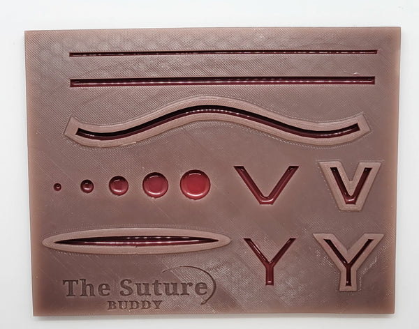 The Suture Buddy Pad with Port Holes